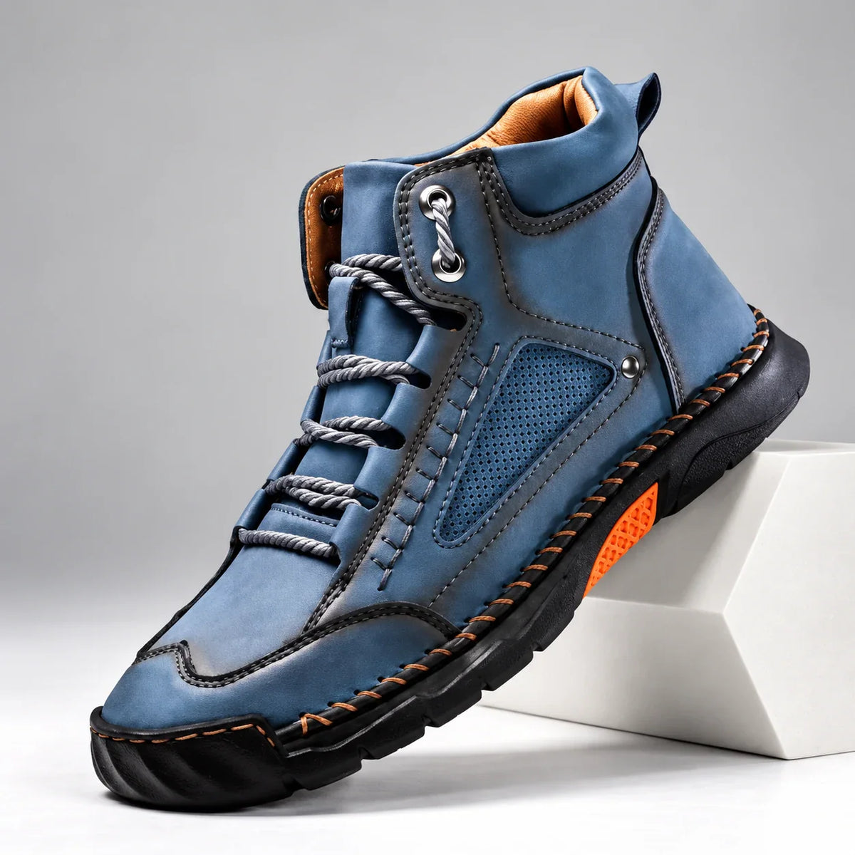 Bradshaw men's hiking boots in blue, single boot at an angle on a light studio background