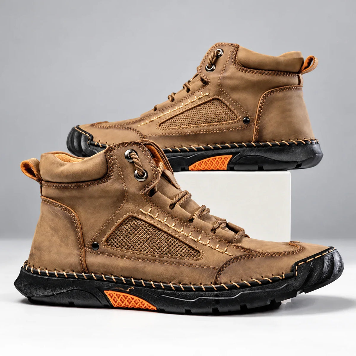 Bradshaw men's hiking boots in camel, side view of pair on a light studio background