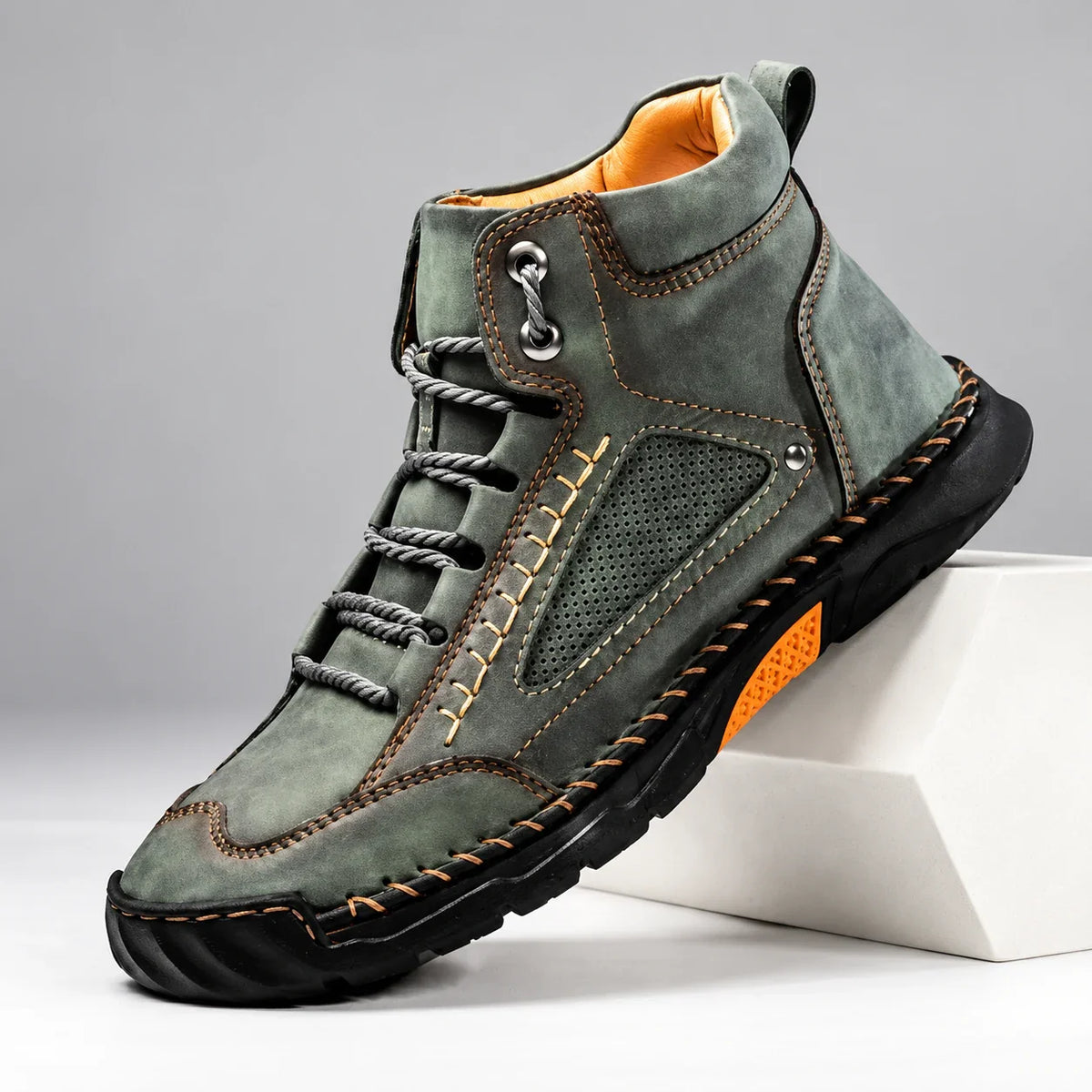 Bradshaw men's hiking boots in green, single boot at an angle on a light studio background