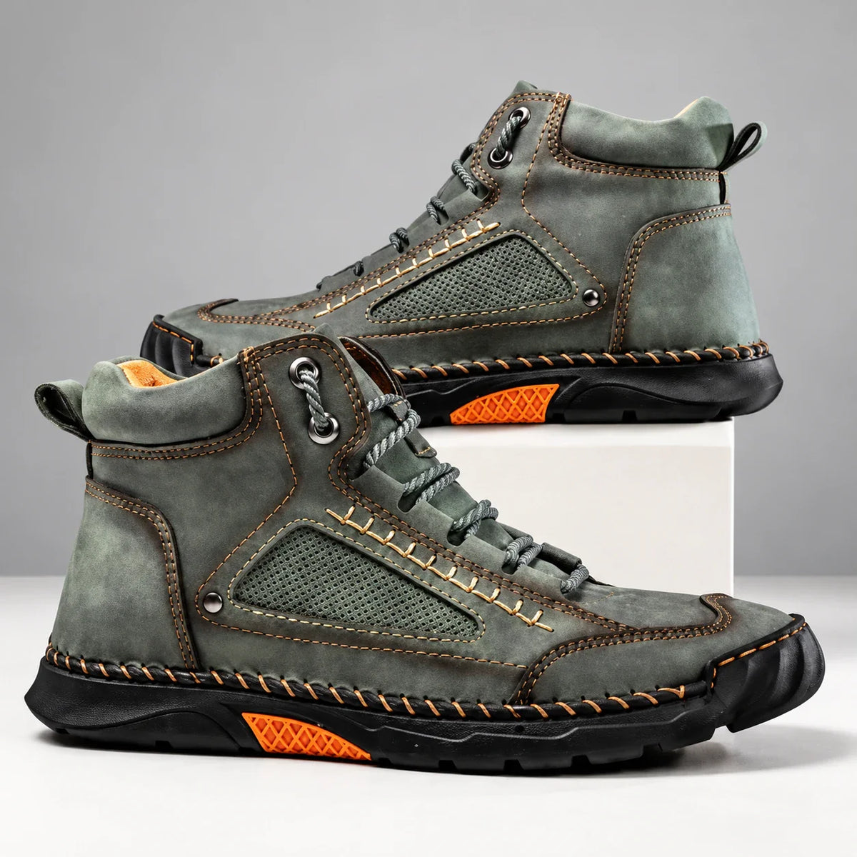 Bradshaw men's hiking boots in green, side view of pair on a light studio background