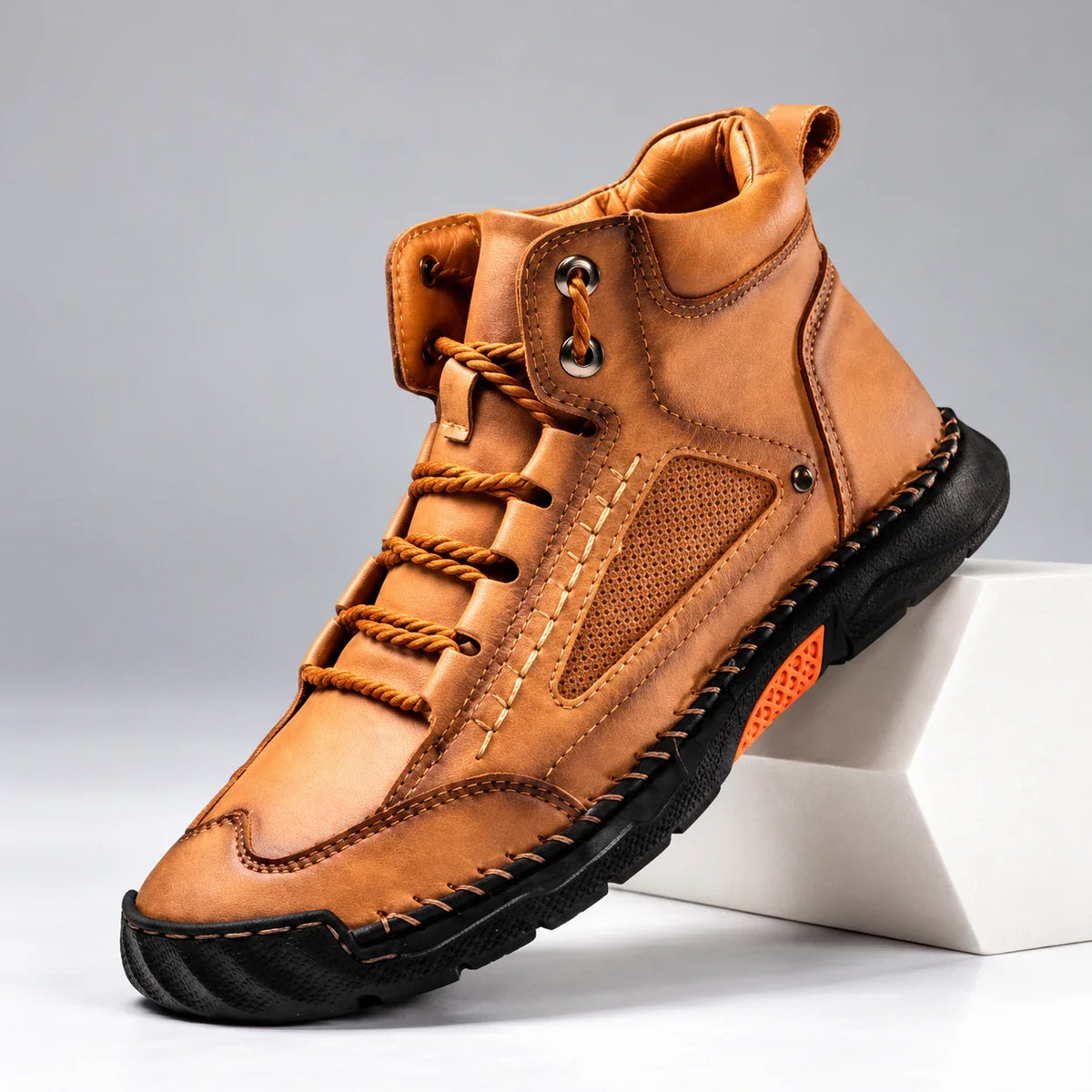 Bradshaw men's hiking boots in tan, single boot at an angle on a light studio background