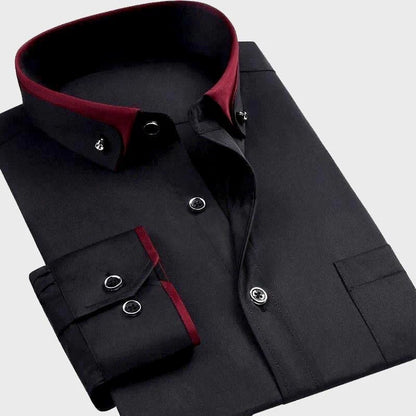 Black shirt folded to show the red-lined collar, cuff and pocket
