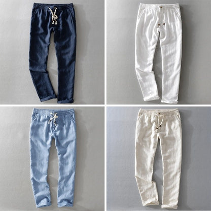 Four pairs of drawstring pants shown together, one of each colour
