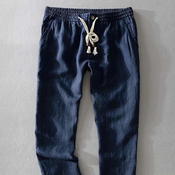 Close view of the navy elastic waistband and tassel cord