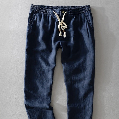 Close view of the navy elastic waistband and tassel cord