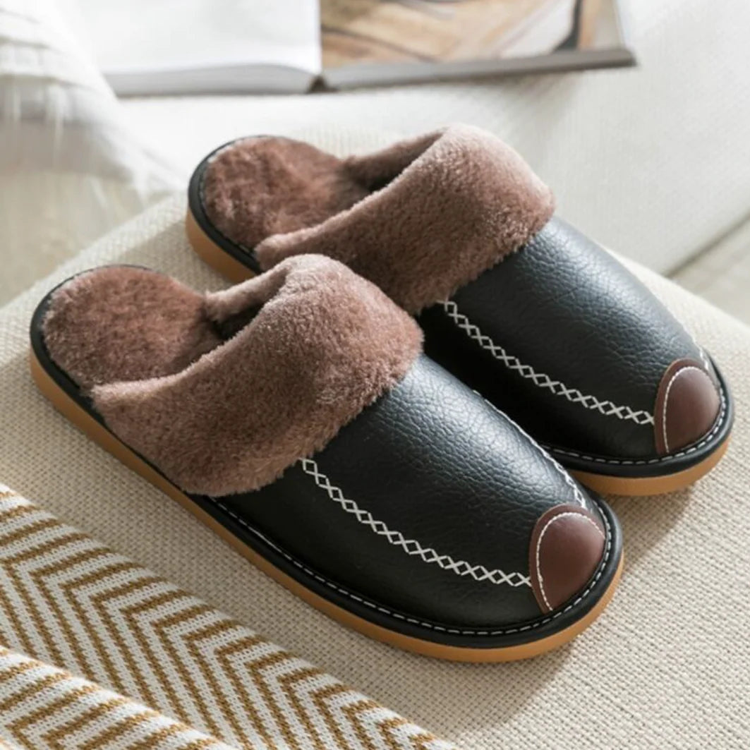 Garrison scuff slippers on a cushioned seat
