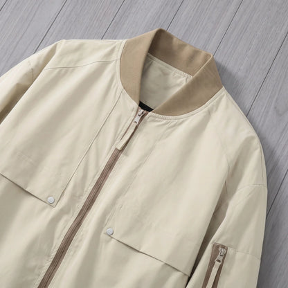 Men's bomber jacket with snap pockets ribbed collar, zip and snap chest pocket close-up
