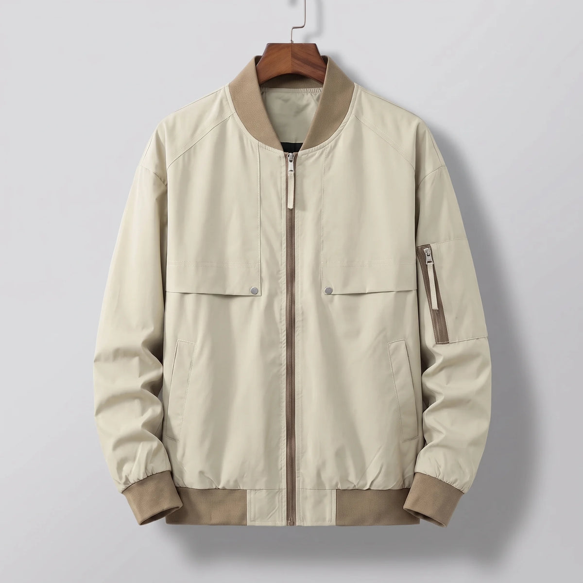 Men's bomber jacket with snap pockets, studio view