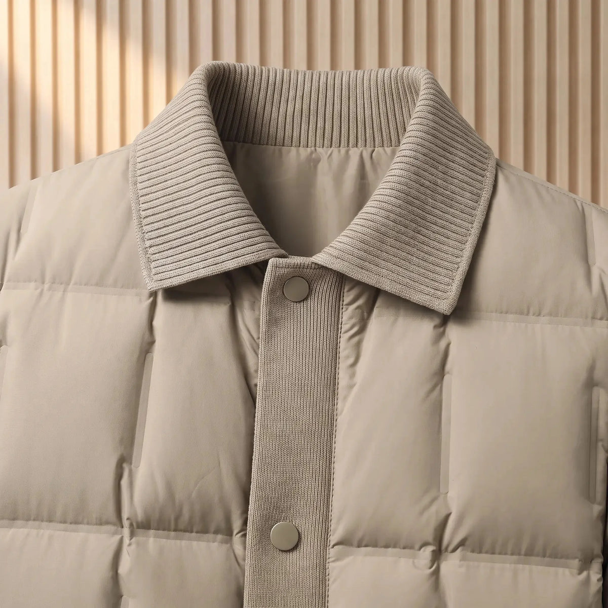 Men's box-quilted puffer jacket knit collar and snap front close-up