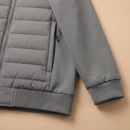 Men's hybrid puffer jacket zip pocket and ribbed cuff close-up