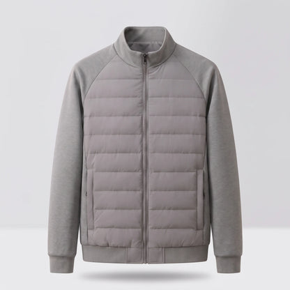 Men's hybrid puffer jacket with knit sleeves, studio front view