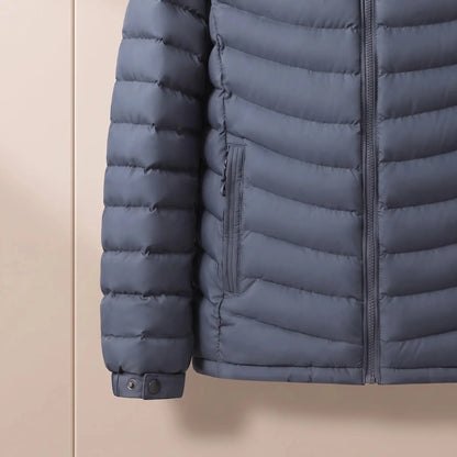 Men's hooded puffer jacket sleeve and snap-tab cuff close-up