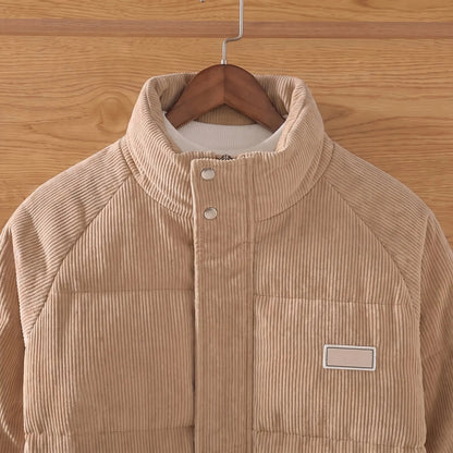 Men's padded corduroy puffer jacket stand collar and throat snaps close-up