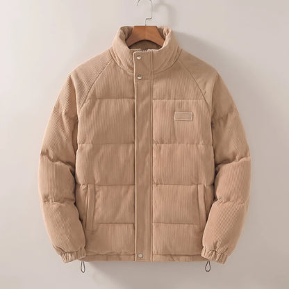 Men's padded corduroy puffer jacket, studio view