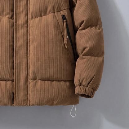 Men's padded puffer jacket zip pocket and drawcord hem close-up