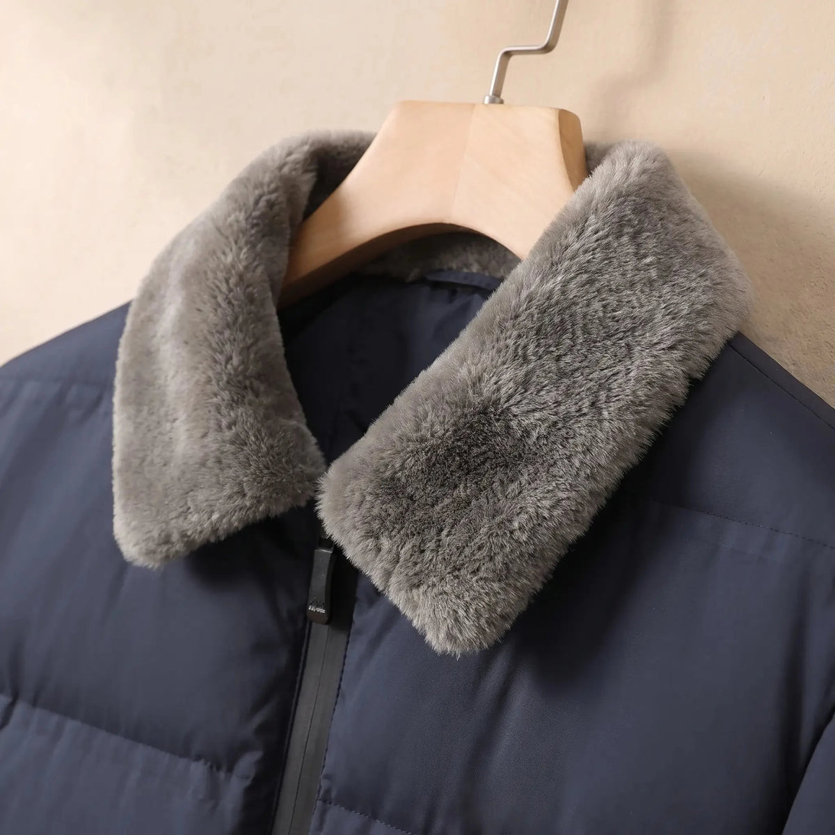 Men's quilted puffer jacket plush collar and front zip close-up
