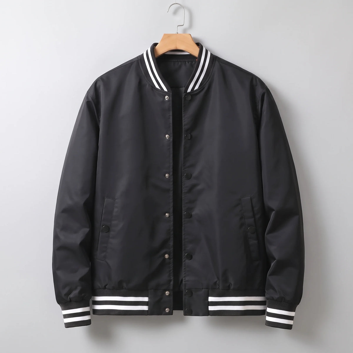 Men's snap front bomber jacket, studio view