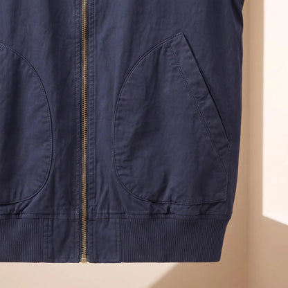 Men's washed bomber jacket curved pocket and ribbed hem close-up