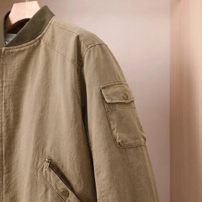 Men's washed twill bomber jacket sleeve pocket and zip close-up