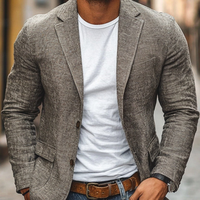 Close view of the textured weave, notch lapel and button on the sport coat