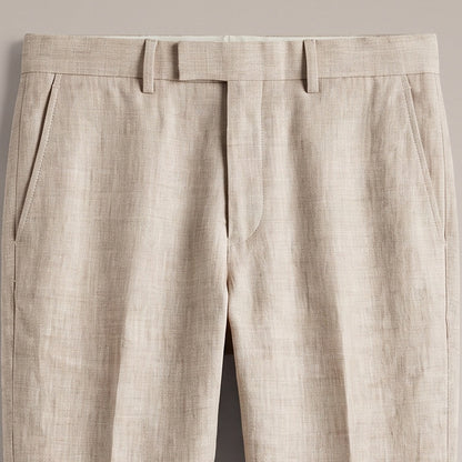 Close view of the flat front waistband, belt loops and side pocket