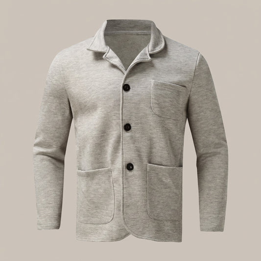Light gray unstructured blazer with three buttons and patch pockets, front view