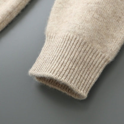 Close view of the ribbed cuff on the knit jacket sleeve