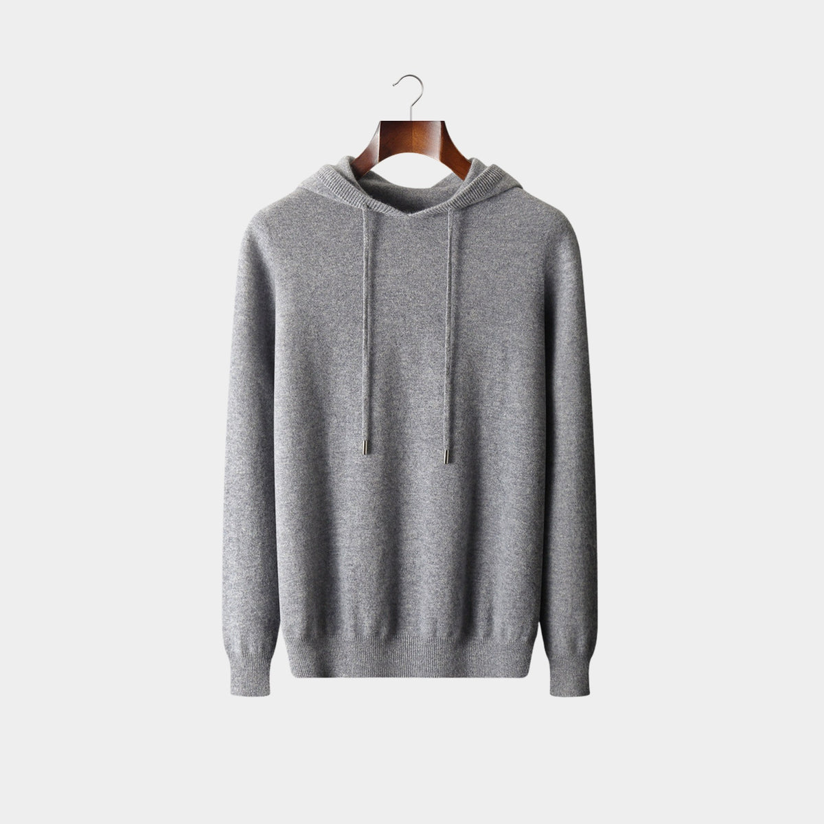 Light gray knit hooded sweater with drawcord and ribbed cuffs, front view