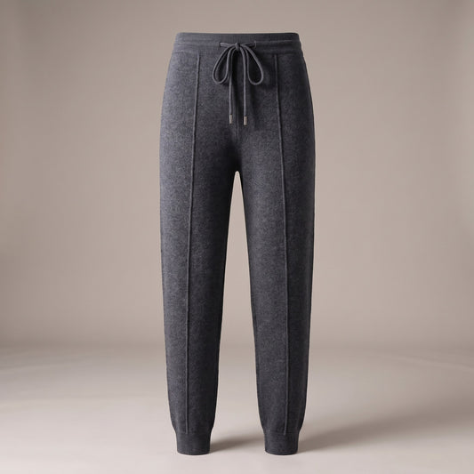 Dark gray knit drawstring joggers with ribbed cuffs, front view