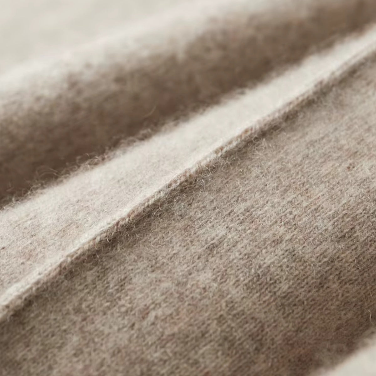 Close view of the knit texture and front seam