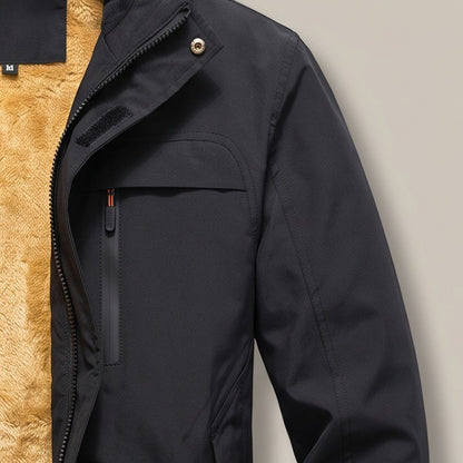 Close view of the zip chest pocket on the hooded zip jacket