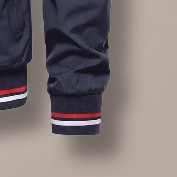 Close view of the striped cuff on the bomber jacket