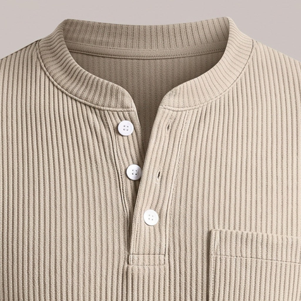 Close view of the round band neckline and three-button placket on the henley