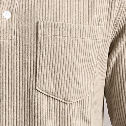 Close view of the chest pocket on the ribbed henley