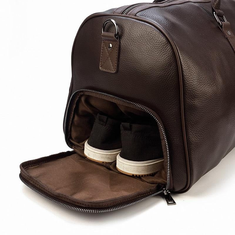 Side shoe compartment of the weekender duffle bag, open