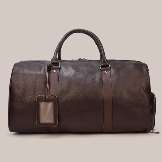 Brown weekender duffle bag with ID tag holder, front view