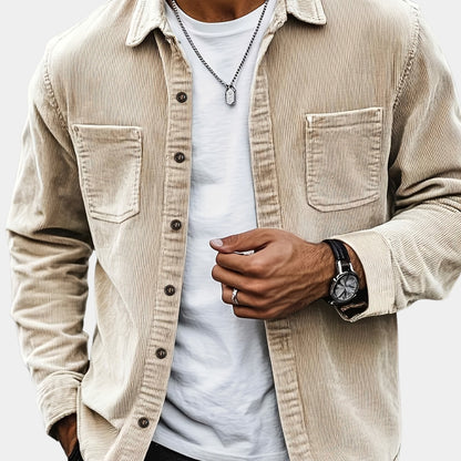 Beige men's corduroy overshirt styled open on a plain background