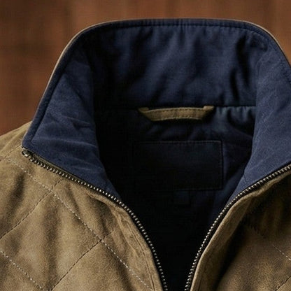 Stand collar and zip top of a men's diamond stitch vest