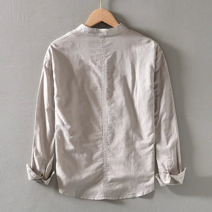 Back of the khaki band-collar shirt on a hanger