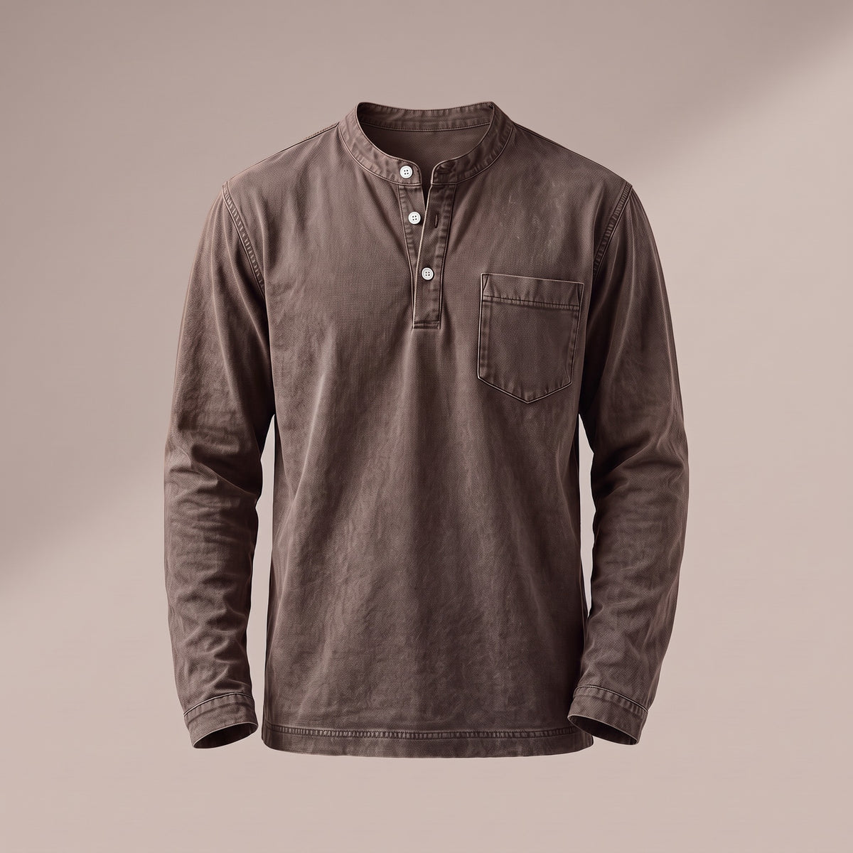 Washed brown long sleeve henley with a three-button placket and a chest pocket, front view