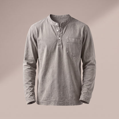Washed stone gray long sleeve henley with a three-button placket and a chest pocket, front view