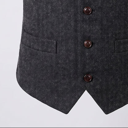 Close view of the lower pocket on a men's herringbone waistcoat