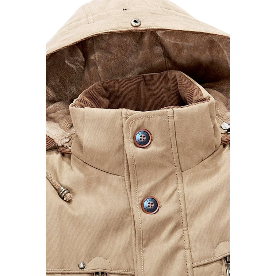 Close view of the hood opening and two metal buttons at the collar