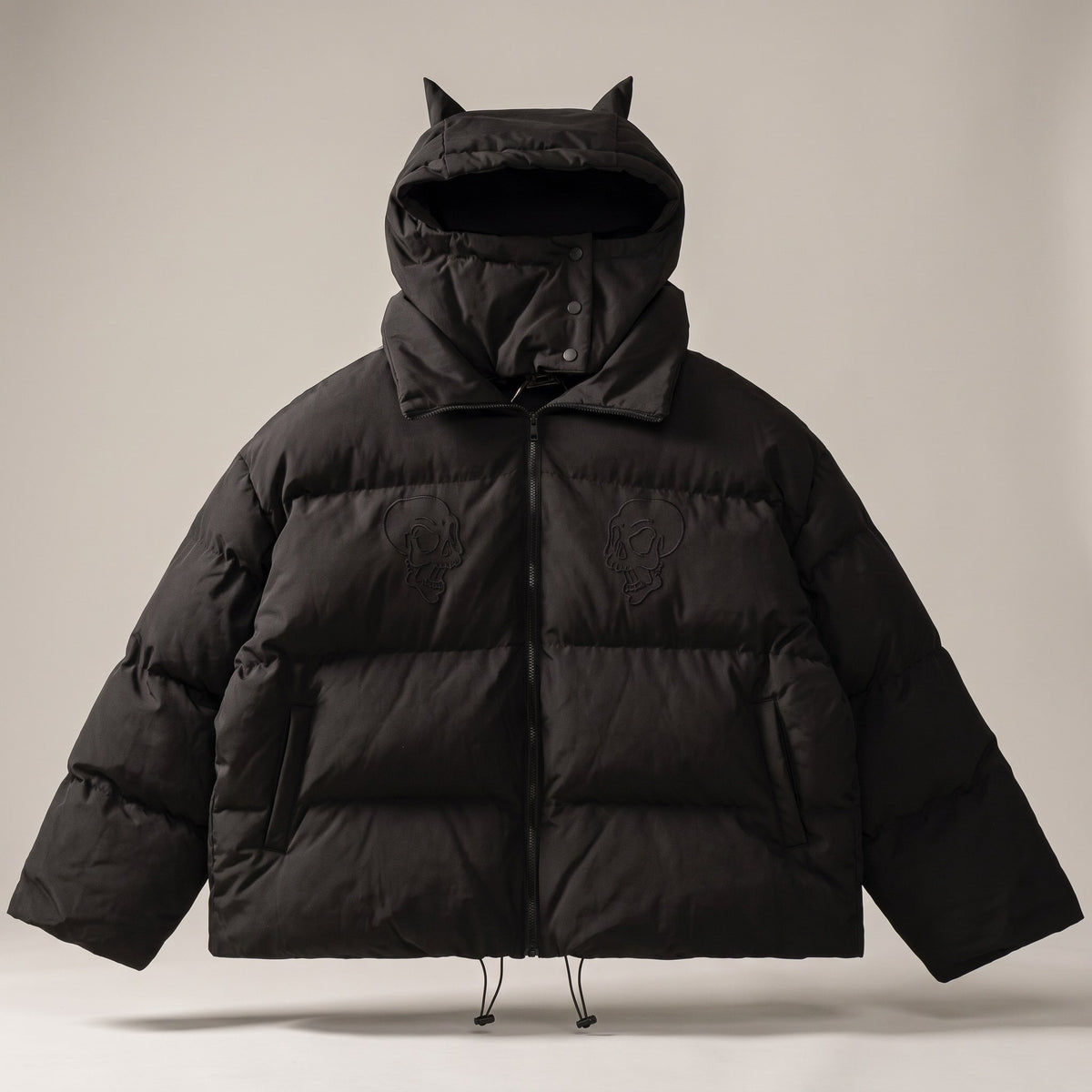 Black quilted puffer jacket with a horned hood and zip front, front view