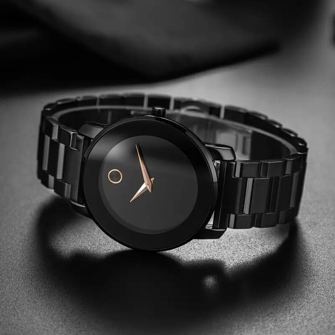 Black Larkin watch at an angle on a dark surface