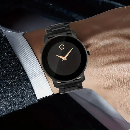 Black Larkin watch worn on a wrist under a white shirt cuff