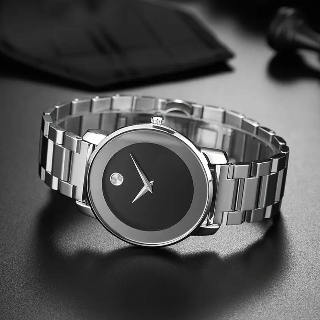 Silver Larkin watch at an angle on a textured dark surface