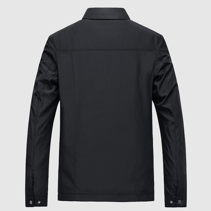 Back of the black jacket with a yoke seam and flat collar