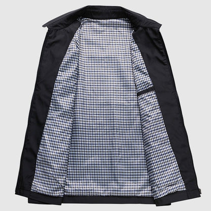 Black jacket opened flat to show the full checked lining
