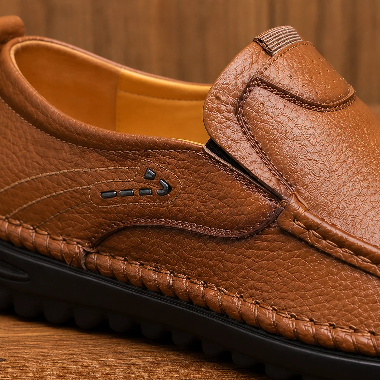 Close-up of LuxeMove Soft Shoes stitching leather texture and sole